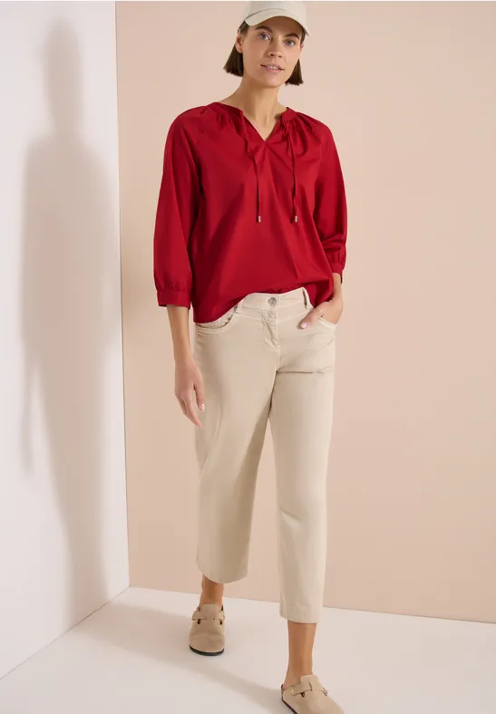 Blouse met 3/4 mouwen en gespleten hals in effen kleur