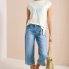 Shirt met overhangende schouder en knoopdetail