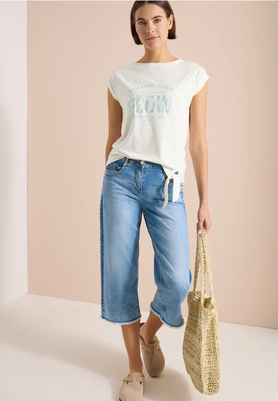 Shirt met overhangende schouder en knoopdetail