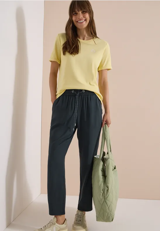 Mid Waist Slim Leg broek in Loose Fit