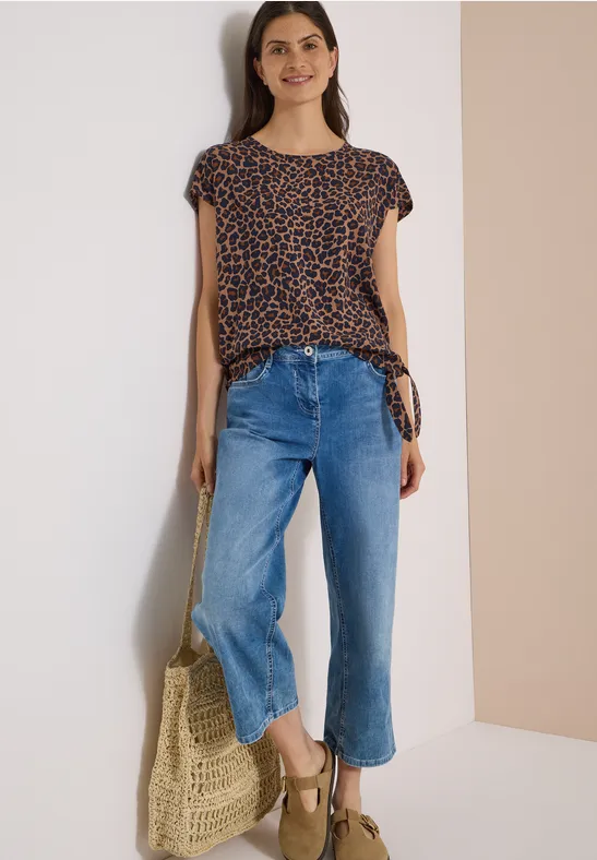 Blouse met afhangende schouders en knoop