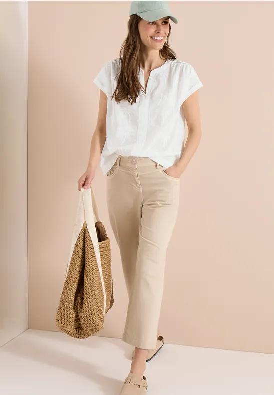 Blouse met hangende schouder en borduursel